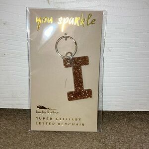 Letter I keychain glittery gold new in package
